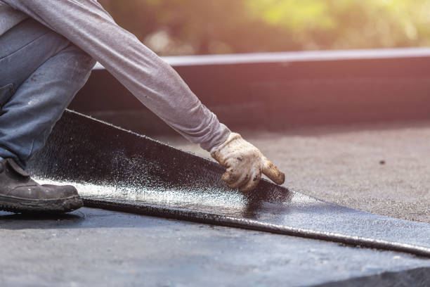 Professional Emergency Waterproofing technician working in Hancock, MI